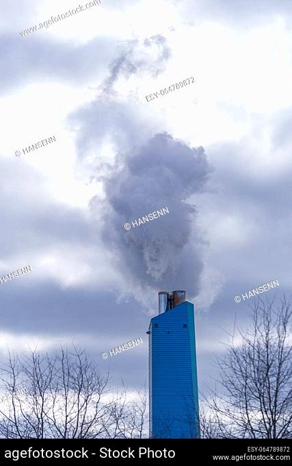 smoking chimney of a waste treatment plant