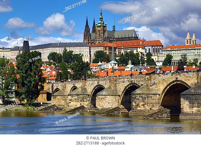 St. Vitus Cathedral and Prague Castle with the Charles Bridge over the Vltava River in Prague, Czech Republic