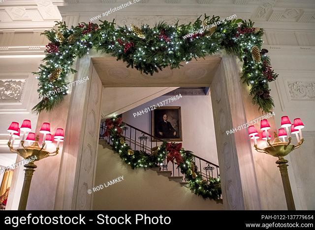 The Grand Staircase of the White House is decorated during the press preview of the 2020 Christmas decorations at the White House in Washington, DC on Monday