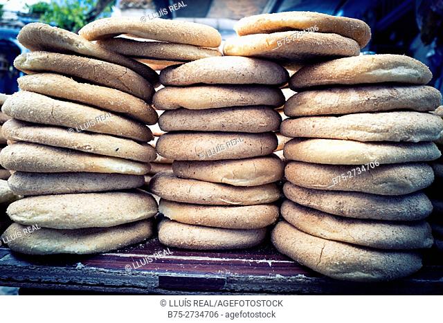 Basic Moroccan breads stacked on a table. Chaouen, Morocco