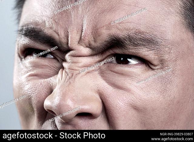 Extreme Close up on angry mans face