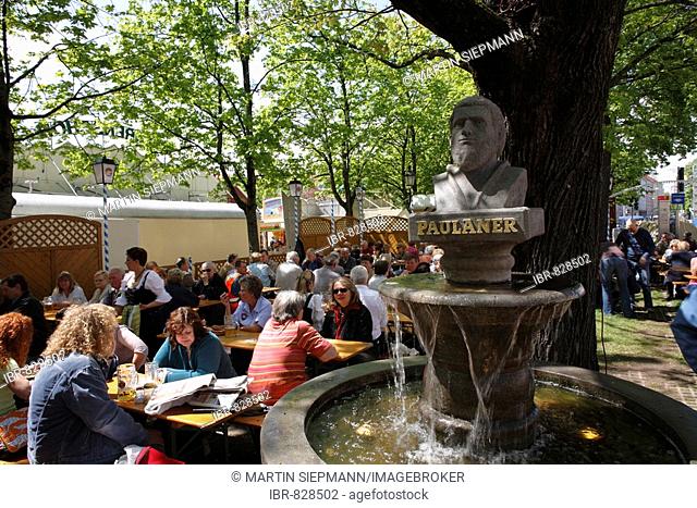 Beer garden at the Paulaner Fountain during Auer Dult market in May, Mariahilfplatz Square, Munich, Bavaria, Germany, Europe