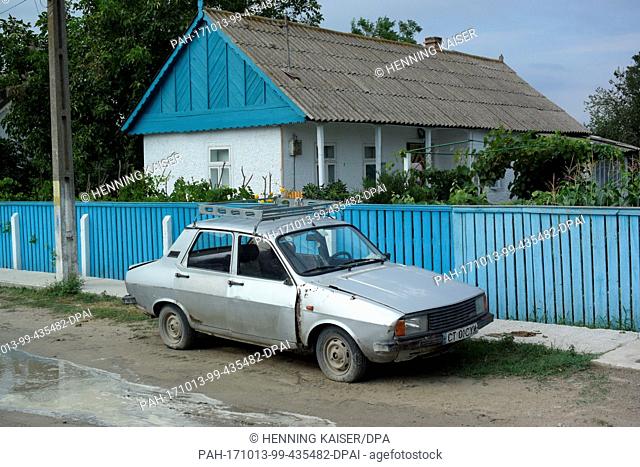 An old car of the brand Dacia stands on a street in Sfantu Gheorghe in the Danube delta, Romania, 14 August 2017. The village can only be reached via waterway