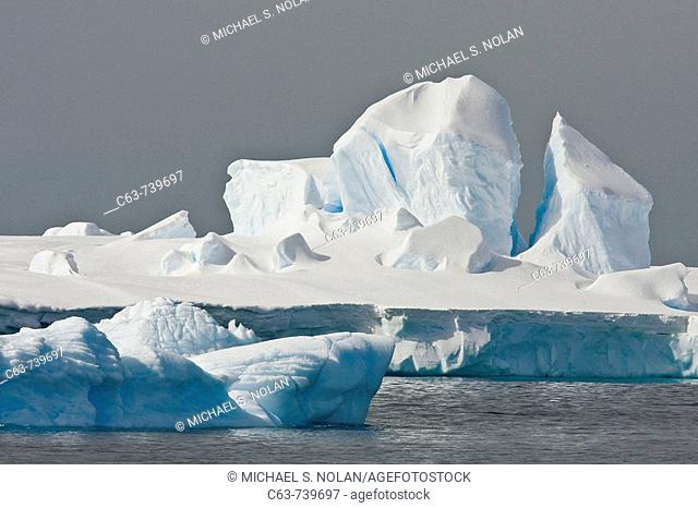 Iceberg detail in and around the Antarctic Peninsula during the summer months  More icebergs are being created as global warming is causing the breakup of major...