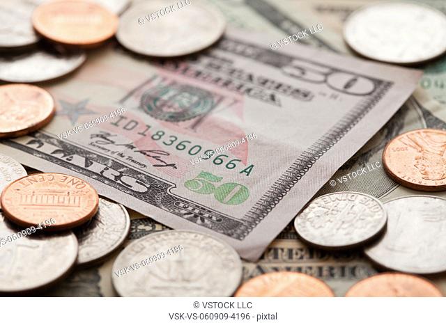 USA, Illinois, Metamora, Studio shot of American banknotes and coins