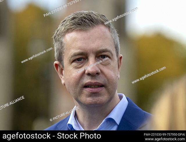 30 October 2023, Berlin: Stefan Evers (CDU), Berlin's finance senator, stands during a press statement on the cleaning measures at the Brandenburg Gate on...