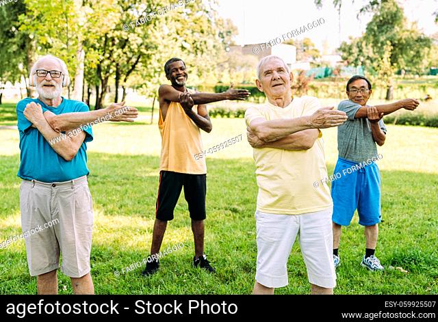 group of senior friends training at the park. Lifestyle concepts about seniority and third age