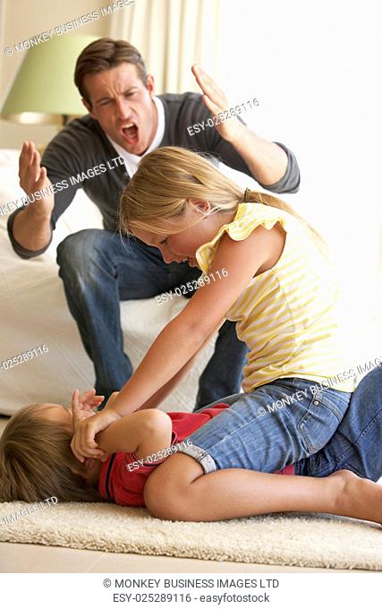 Children Fighting In Front Of Father At Home