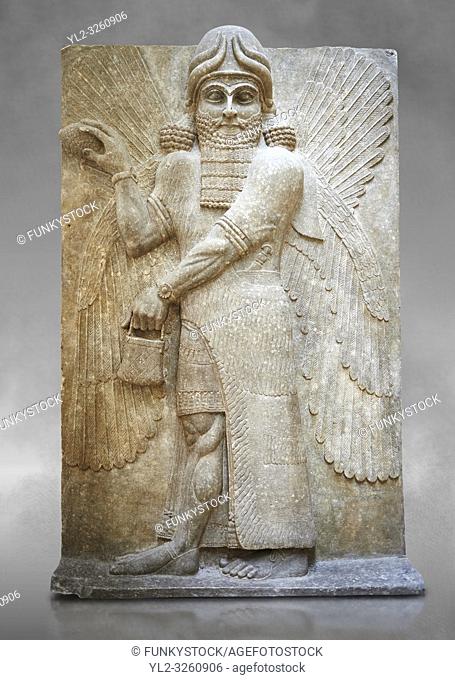 Stone relief sculptured panel of a Genie blessing. Gate No 3, Inv AO 19863 from Dur Sharrukin the palace of Assyrian king Sargon II at Khorsabad, 713-706 BC