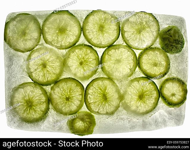 Ice Block with Slices of frozen Lime Fruit