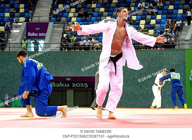 Lukas Krpalek (in white) from Czech Republic and Cyrille Maret from France fight during the Men's Judo under 100kg in Heydar Aliyev Arena at the Baku 2015 1st...