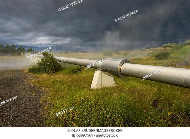 Pipeline with boiling water for the supply of Akranes and Borgarnes, Deildartunguhver, highest-flow hot spring of Iceland with 180 liters of boiling water per...
