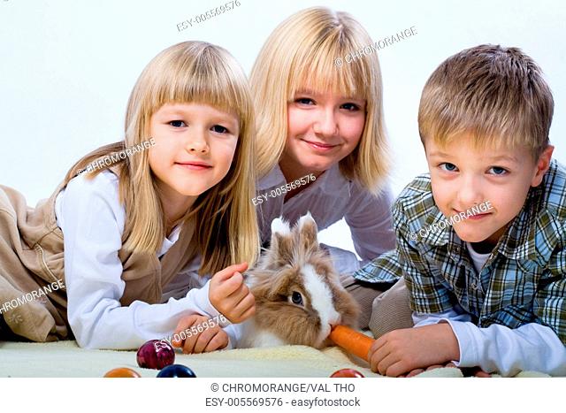 kids and a eastern rabbit
