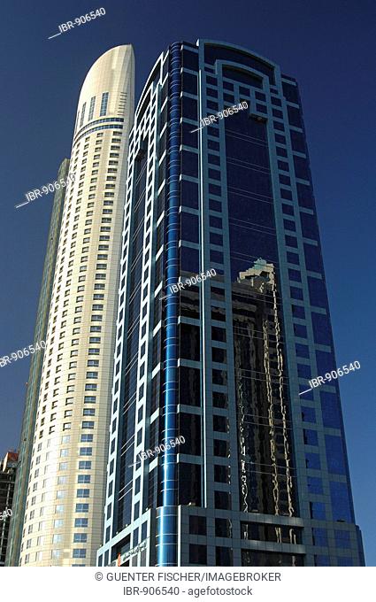 High rise towers, Park Place Tower behind the API World Tower, Sheikh Zayed Road, Dubai, United Arab Emirates