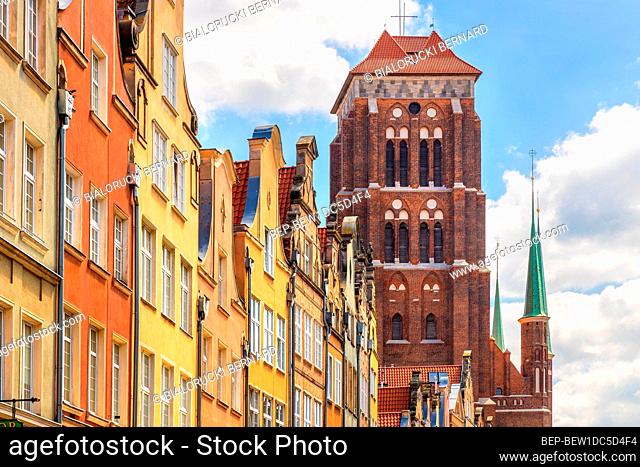 Gdansk, Pomerania / Poland - 2020/07/14: Twin towers of St. Maryâ€™s Basilica - Bazylika Mariacka - seen from Piwna street in the historic old town city center...