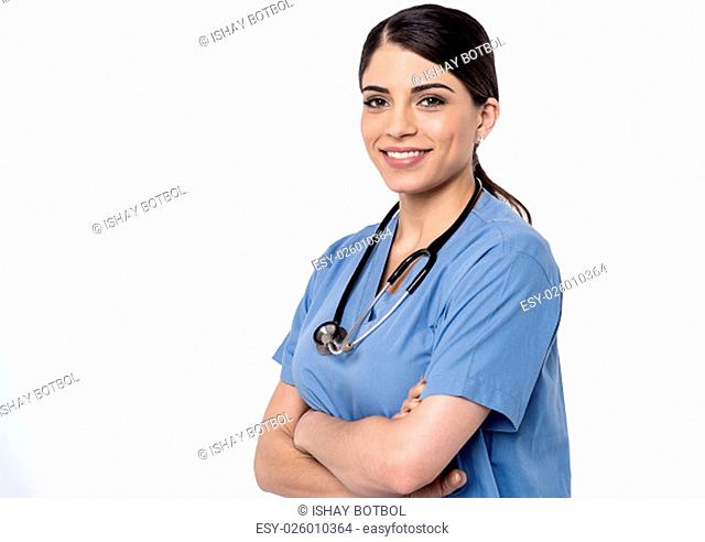 Smiling female doctor posing with arms crossed