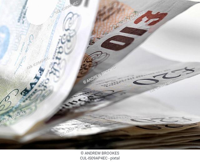Close up detail of a stack of British banknotes