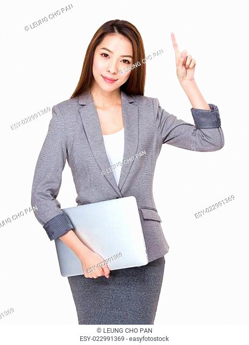 Asian Businesswoman hold with notebook and finger point up