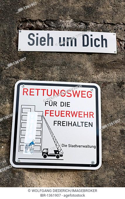 Signs, Sieh um Dich, German for look around and Keep Clear for the Fire Brigade, Trier, Rhineland-Palatinate, Germany, Europe