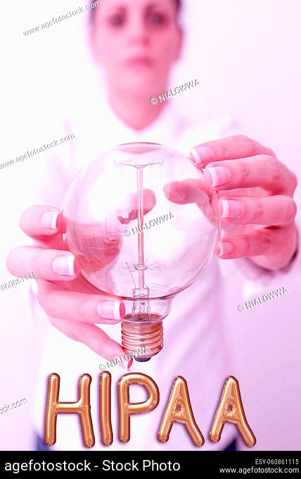 Inspiration showing sign Hipaa, Word for Acronym stands for Health Insurance Portability Accountability Lady in outfit holding lamp with two hands presenting...