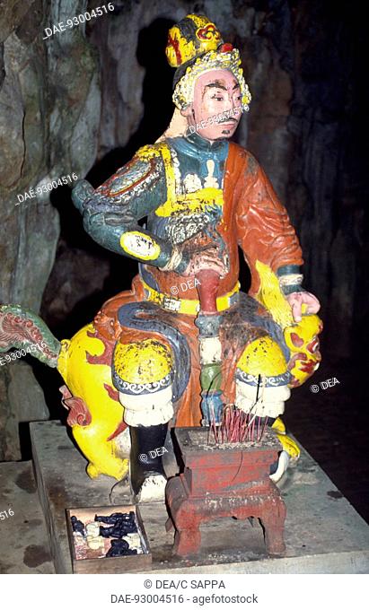Guardian statue of the Genius in a Pagoda in Huyen Chong cave, Marble Mountain, near Da Nang, Vietnam
