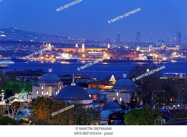 Turkey, Istanbul, View of Bath of Roxelane, Blue Mosque, in the background Kadikoy at dusk