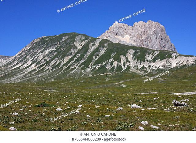 Italy, Abruzzo, Campo Imperatore plain. In the background the Corno Grande Mount, Gran Sasso and Monti della Laga national park