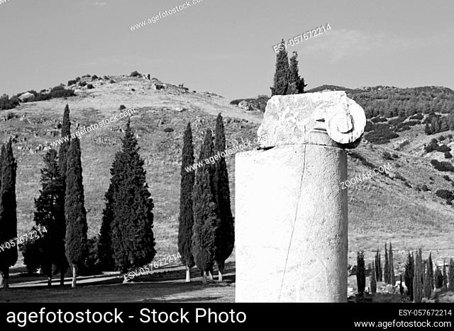 pamukkale  old    construction   in asia turkey the column and the roman temple