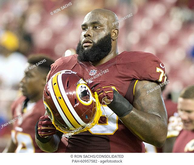 Washington Redskins tackle Morgan Moses (76) looks on as his team warms-up prior to the game against the Detroit Lions at FedEx Field in Landover