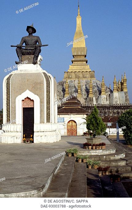 Monument to Setthathirath I in front of Wat That Luang Temple Complex, the great sacred stupa erected by Setthathirat I (rebuilt in the 20th century)