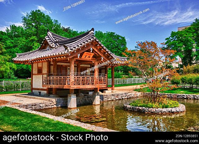 Korean Pagoda with small lake in the Park