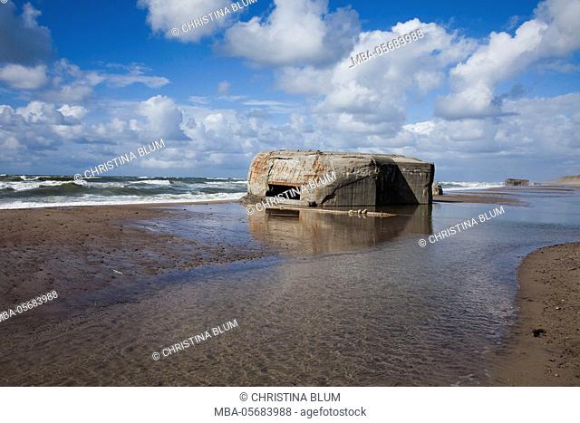 Old bunker on the beach of the North Sea