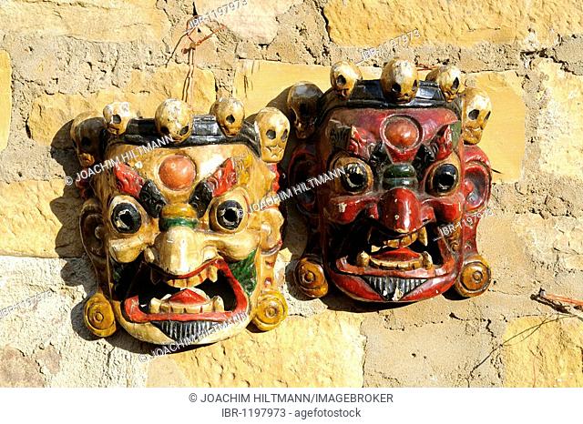 Nepalese dance masks at a souvenir stand, Jaisalmer, Rajasthan, North India, India, South Asia, Asia