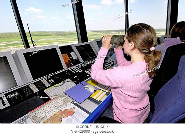 , GERMANY, Hamburg, 19.04.2007,  Air traffic controller in the tower of airport Hamburg. - Hamburg, GERMANY, 19/04/2007