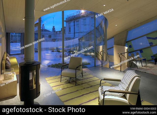Top floor seating area, roof terrace beyond with curved glass screen. Maggies Centre, St Bartholomews Hospital, EC1A 7BC, United Kingdom