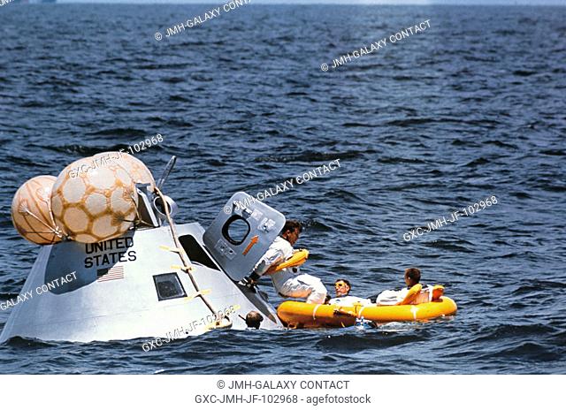 The prime crew of the first manned Apollo mission (Spacecraft 101Saturn 205) participates in water egress training in the Gulf of Mexico