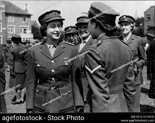 Princess Elizabeth Visits A.T.S. Pardade. Smiling picture of Princess Elizabeth inspecting A.T.S. at the Imperial Staff College, Windsor