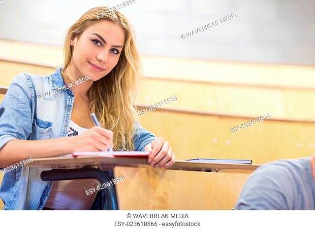 Smiling female student during class