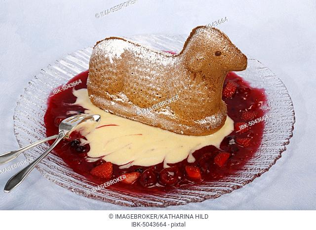 Swabian dessert, Easter lamb, sweet sponge mixture, cake, pastry with compote, red grits, chaudeau sauce, Germany, Europe