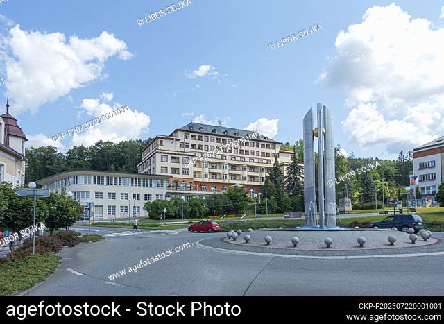 Hotel Palace, Luhanka travel agency office and a fountain on a roundabout at Namesti 28 Rijna Sguare, Luhacovice, Zlin Region, Czech Republic, July 14, 2023