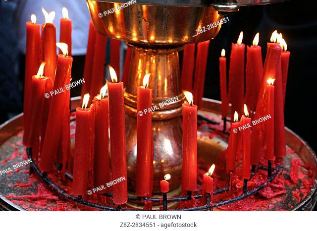 Red candles burning at the Longshan Buddhist Temple at Chinese New Year in Taipei, Taiwan