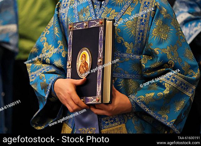 RUSSIA, MOSCOW - SEPTEMBER 1, 2023: A Russian Orthodox clergiman holding Holy Scriptures is seen during a Divine Liturgy celebrating the Feast Day of the Don...