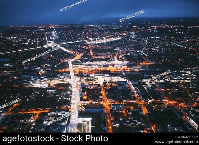 Brest, Belarus. Night Aerial Bird's-eye View Of Brest Cityscape Skyline. Night Traffic In Residential District
