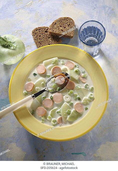 Kohlrabi soup with Vienna sausages & spring onions