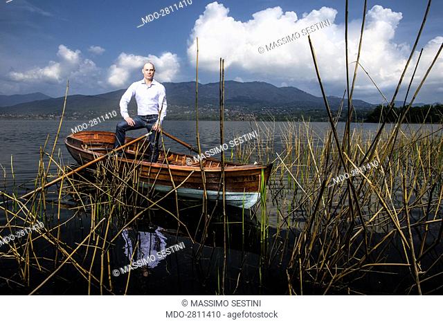 Riccardo Bossi, son of Italian politician Umberto Bossi, posing at Lake Varese during a photo shooting. Italy, Cazzago Brabbia. 13th February 2013