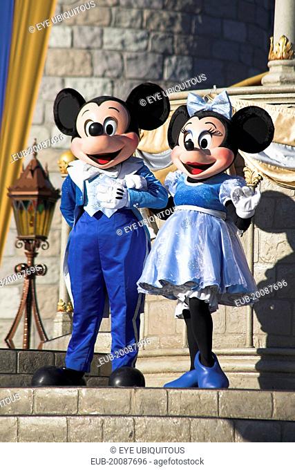 Walt Disney World Resort. Mickey and Minnie Mouse characters on stage in the Magic Kingdom
