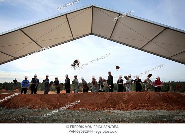 Politicians and military members dig at the site of the new ""ROB (Rhine Ordnance Barracks) Medical Center"" on the grounds of the US American ""Rhine Ordnance...