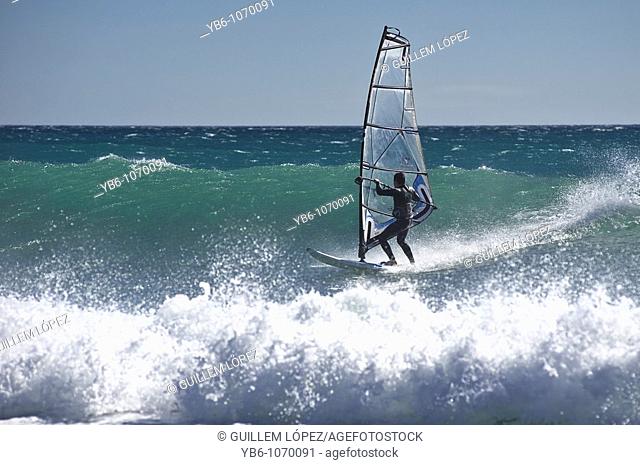 Windsurfer riding the waves  Barcelona, Spain