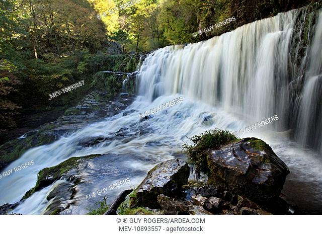 Sgwd Isaf Clun Gwyn waterfall on the river Mellte in the Brecon Beacons - October . Mid-Wales - UK