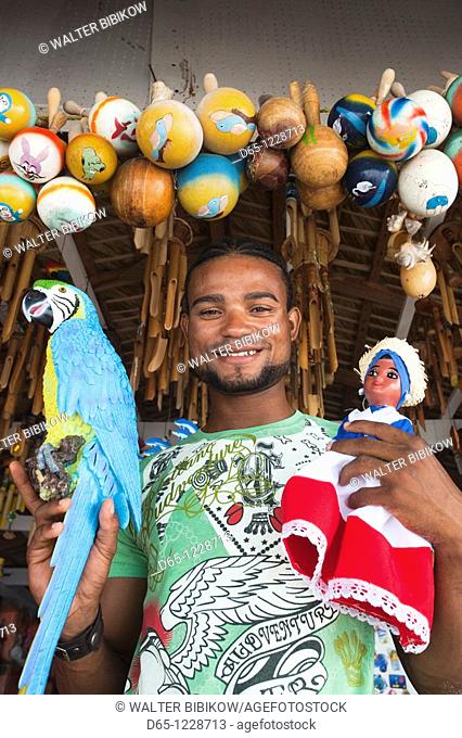 Dominican Republic, Punta Cana Region, Bavaro, beach souvenir shop salesman, R, MR-DRE-09-12